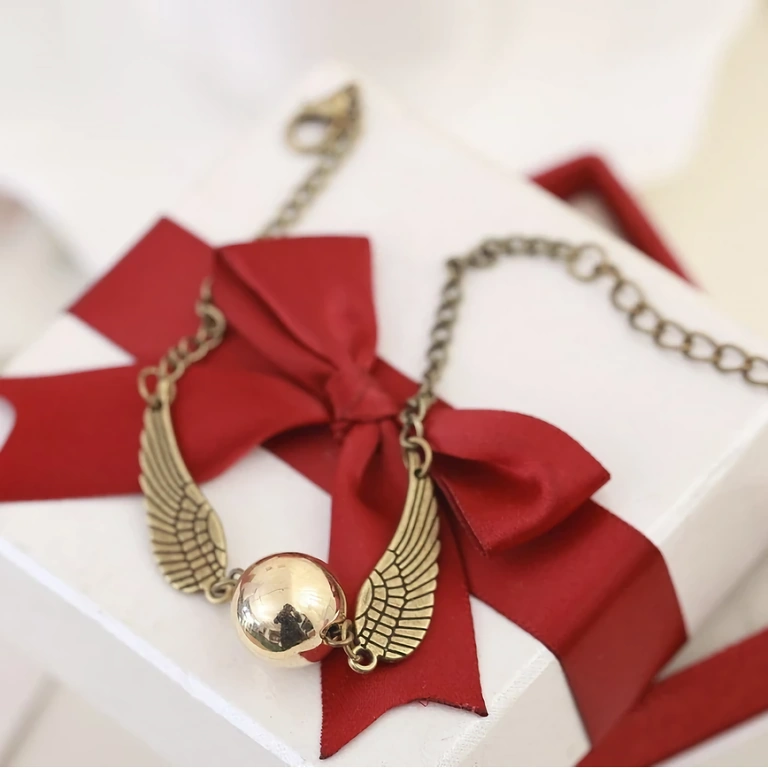 Zapestnica Harry Potter Zapestnica s temo Harry Potter – model s Snitch