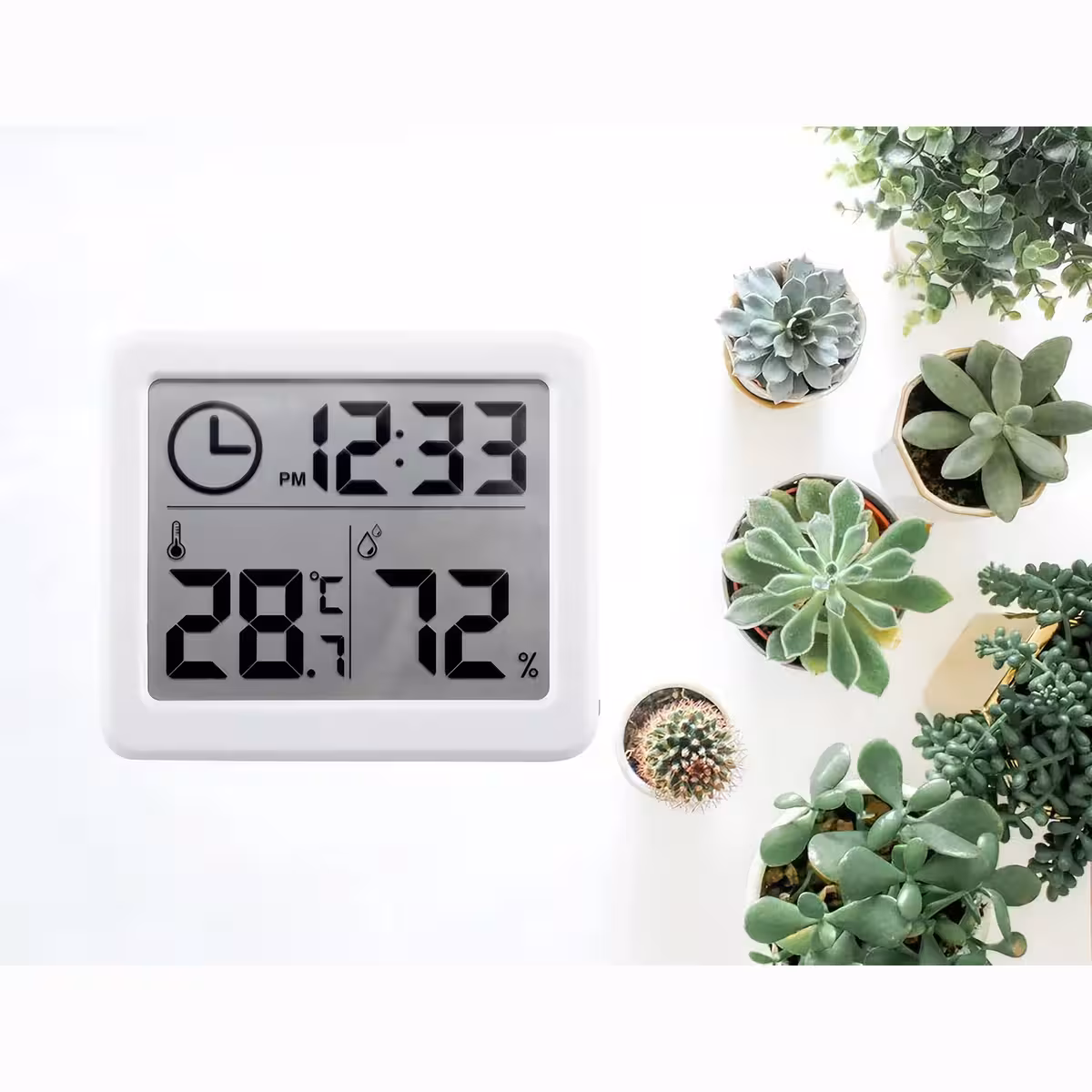 Instrument za merjenje temperature in vlage z digitalno uro in belo ohišje