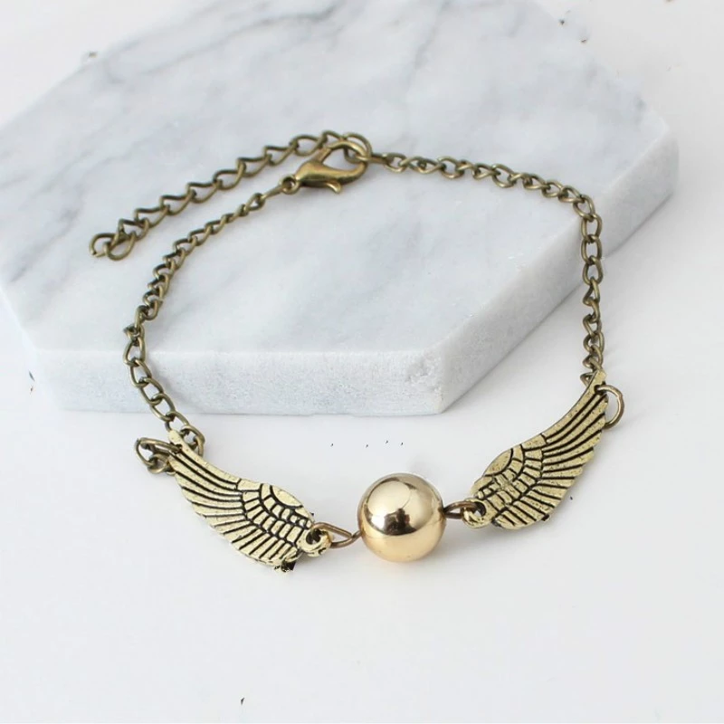 Zlata/srebrna zapestnica Harry Potter Golden Snitch Deathly Hallows